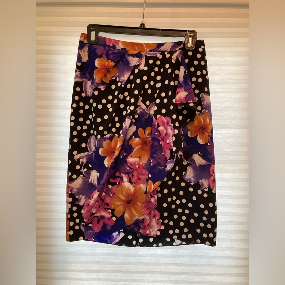 Faux wrap skirt. Knee length.
